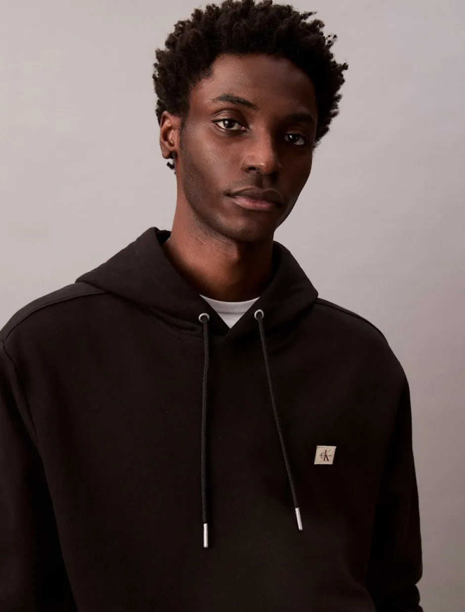 Miesten Huppari, LS EU 350Terry Badge Hoodie>Calvin Klein Jeans